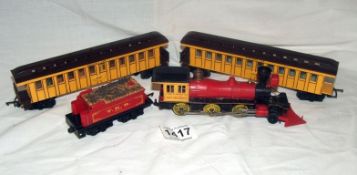 A Triang '00' gauge Davy Crocket Locomotive and carriages