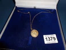 A 9ct gold mount and chain with a gold plated medallion