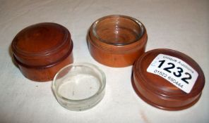 2 Treen screw top pots with glass liners