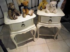 A pair of French style bedsides