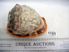 A carved cameo shell