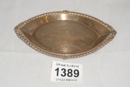 A silver pin dish