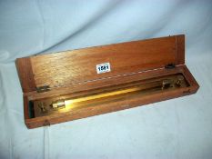 A cased 18" brass navigational rolling rule by Charles Smith & Reddish Ltd.