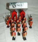 A quantity of Britains Guards and Beefeaters & 2 sentry boxes