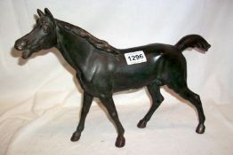 A bronze stallion, missing base