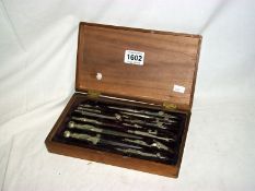 A 19th century cased drawing set in white metal