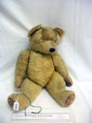 A vintage jointed teddy bear possibly Chad Valley, a/f