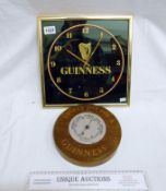 A Guinness wall clock and  a Guinness barometer