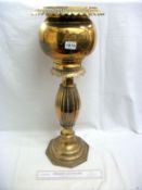 A brass jardiniere and stand