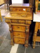 A Continental walnut side cabinet