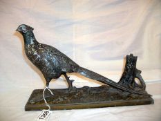 A large cold painted spelter pheasant striker lighter