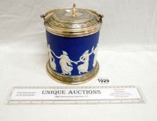 A Jasper ware biscuit barrel with plated lid
