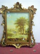 A gilt framed country scene painting