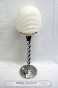 An Art Deco chrome table lamp with opaque shade