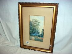 A gilt framed watercolour of cows in field (frame a/f)
