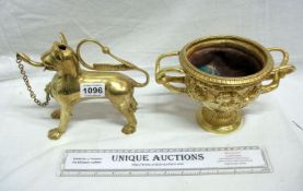 A brass Chinese dog (oil burner?) and an ornate brass bowl