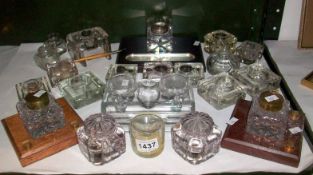 A large quantity of glass inkwells