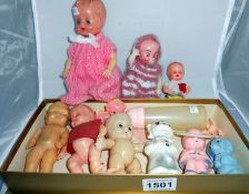 A quantity of small dolls etc.,