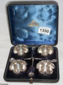 A cased set of 4 silver salts and spoons