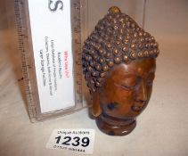 A small Buddha head