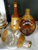 A bottle of Dimple Whisky, A Bell's bell with contents and an empty Dimple bottle