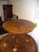 A Dutch marquetry inlaid long tripod table