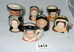 7 Royal Doulton miniature character jugs Henry VIII and six wives