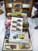 A collection of boxed die cast including Corgi and Lledo