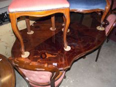 An Italian inlaid dining table and 6 chairs