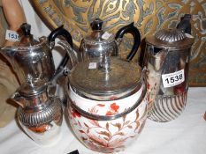 A ceramic biscuit barrel and 4 items of silver plate