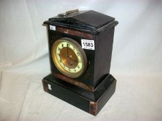 A marble mantel clock