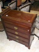 A late 20th century games cabinet with brass inlay