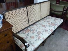 A 3 seater cane backed sofa