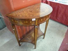 A Marquetry inlaid 'D' shaped console table