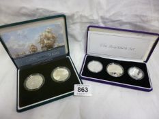 A 200th Anniversary nelson-Trafalgar 2 coin set and a Royal Australian mint 'The Accession' set of 3