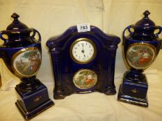 A 3 piece clock garniture in the style of Angelica Kaufman