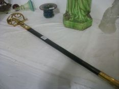 An ornamental sword with brass hilt