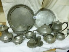 2 four piece silver plate tea sets with trays, cruet etc