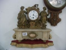 A French clock surmounted figure group