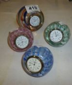 3 Caithness 'Whispers' clock paperweights and a 'New Era' clock paperweight