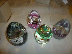 4 Caithness paperweights including 'Cascade' and 'Poppy Meadow'