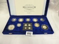 A UK Millenium collection of 13 silver coins