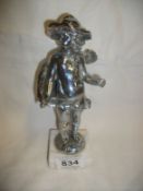 A plated boy Cavalier figure signed on base