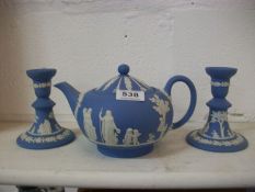 A Wedgwood Jasper ware teapot and candlesticks