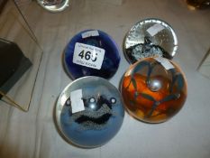 4 Caithness paperweights including 'May Dance' and 'Wave Control'