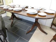 A twin pedestal extending dining table