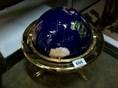 A jewelled table globe on brass stand