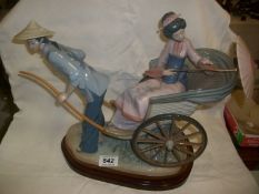 A Lladro Japanese style rickshaw group