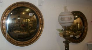 2 Circular gilt framed convex mirrors