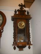 A Victorian mahogany wall clock
